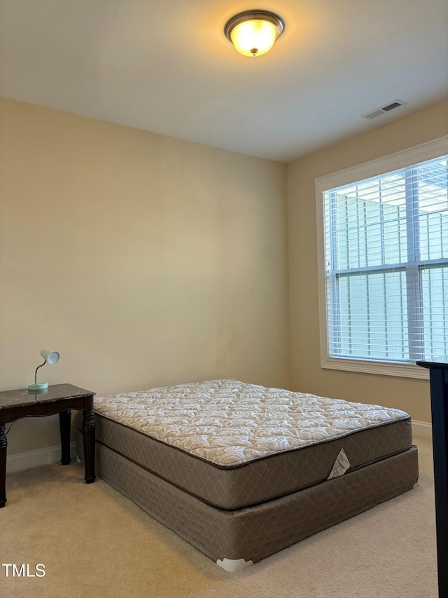 bedroom featuring carpet flooring