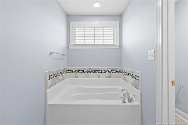 bathroom with a bathing tub