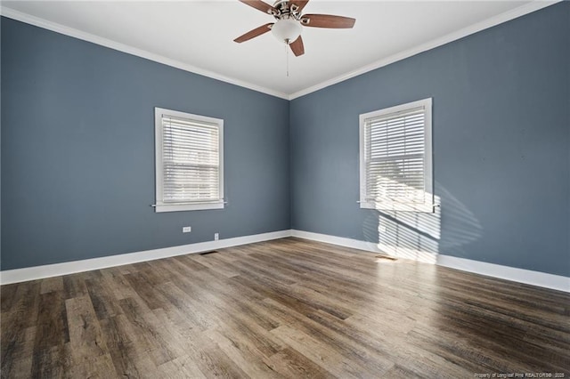 empty room with ceiling fan, ornamental molding, and hardwood / wood-style floors