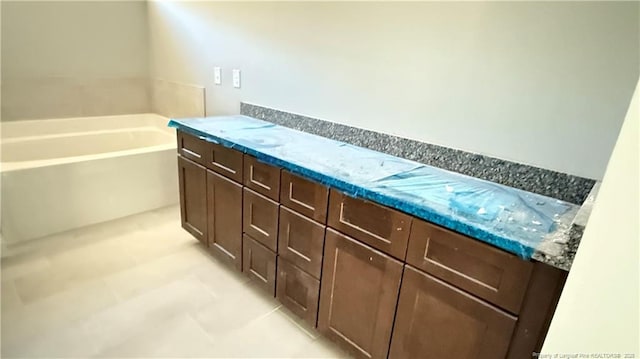 bathroom featuring a garden tub