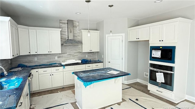425 Shawcroft Rd, Fayetteville, NC 28311 - kitchen featuring backsplash, dark countertops, wall chimney exhaust hood, oven, and a sink