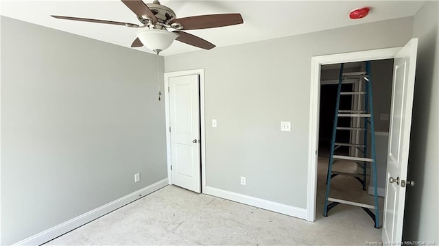 425 Shawcroft Rd, Fayetteville, NC 28311 - unfurnished bedroom featuring concrete floors, baseboards, and a ceiling fan