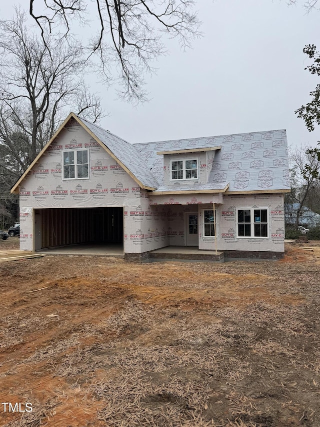 property under construction with an attached garage