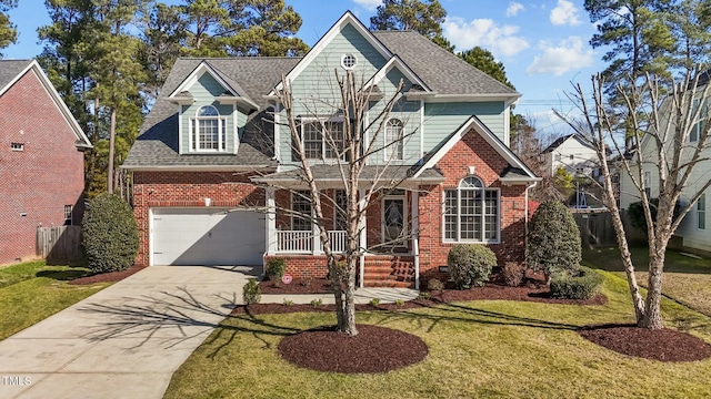 view of front property with a garage and a front yard