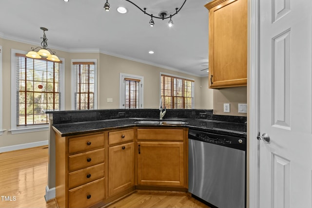 kitchen featuring sink, dishwasher, hanging light fixtures, kitchen peninsula, and dark stone counters