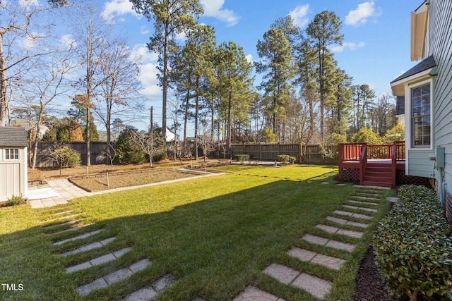 view of yard featuring a wooden deck