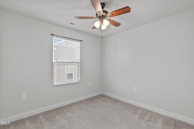 unfurnished room with light carpet and ceiling fan