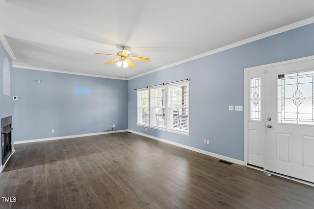 foyer with ceiling fan, dark hardwood / wood-style floors, and crown molding