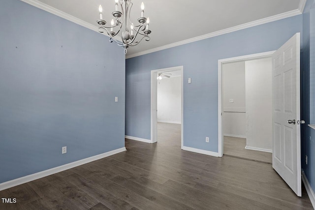 unfurnished room featuring ceiling fan with notable chandelier, wood-type flooring, and ornamental molding