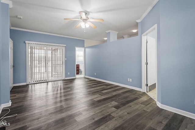 spare room featuring ceiling fan, dark hardwood / wood-style flooring, and crown molding