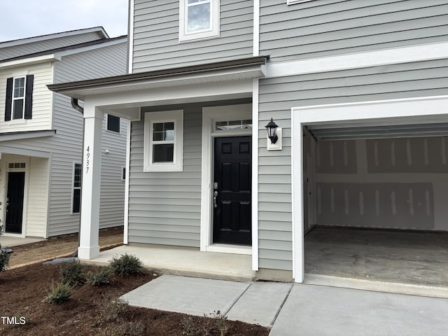 entrance to property featuring a garage