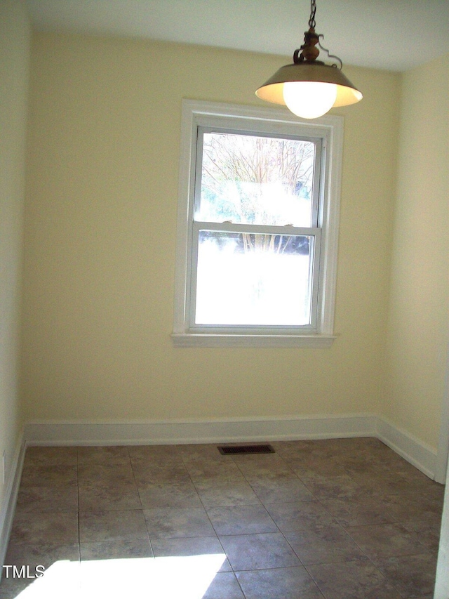 view of unfurnished dining area