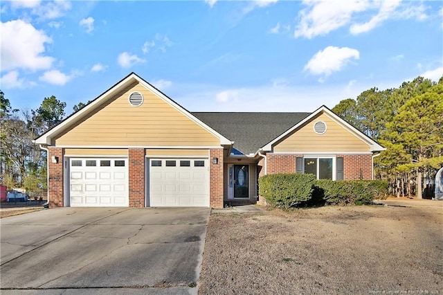 ranch-style house featuring a garage