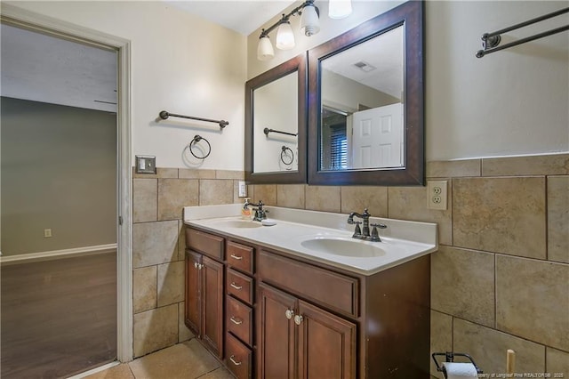 255 Heartwood Dr, Raeford, NC 28376 - bathroom featuring tile walls, vanity, and tile patterned flooring