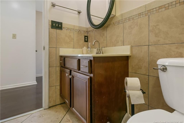 255 Heartwood Dr, Raeford, NC 28376 - bathroom with toilet, vanity, and tile walls