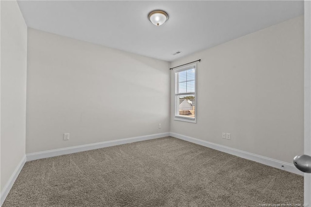 unfurnished room with carpet floors