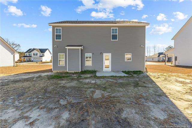 rear view of house with a patio area