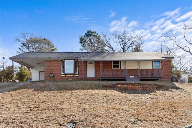 ranch-style house with a carport