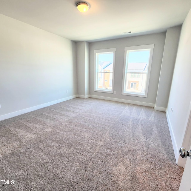 view of carpeted spare room