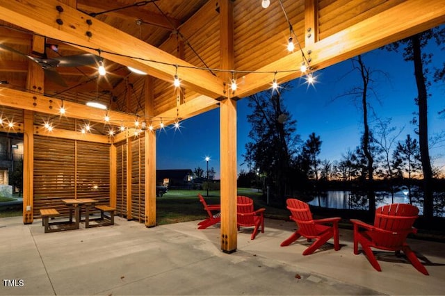 view of patio terrace at dusk