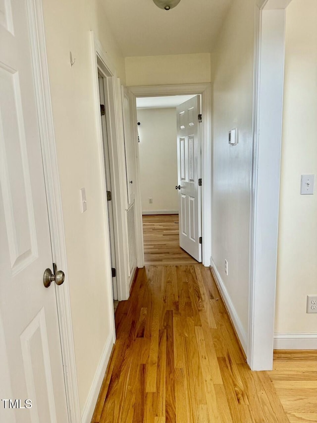 hall featuring light hardwood / wood-style floors