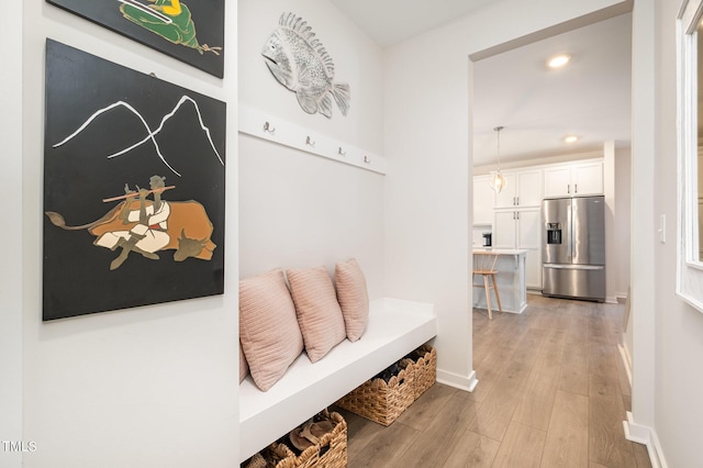 mudroom featuring light wood-type flooring