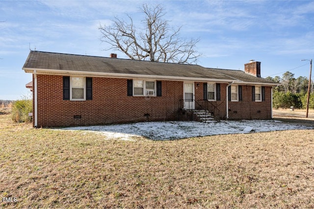 ranch-style house with a front lawn