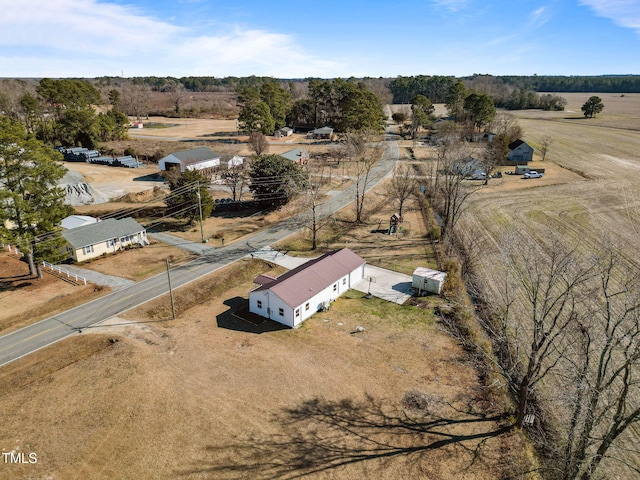 birds eye view of property featuring a rural view