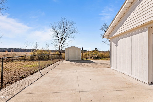 view of patio / terrace featuring a shed