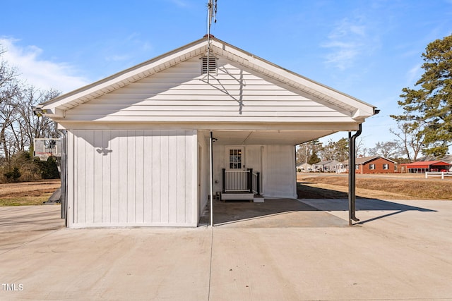 exterior space featuring a carport