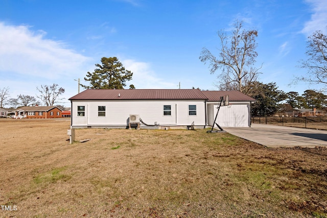 rear view of house with a patio area and a yard