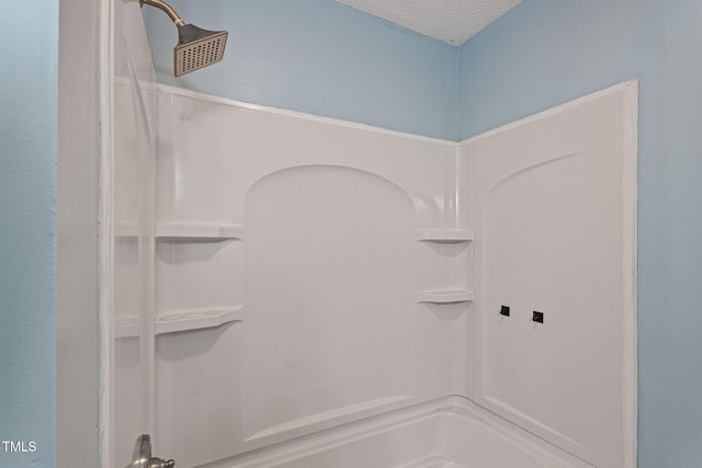 bathroom with a textured ceiling