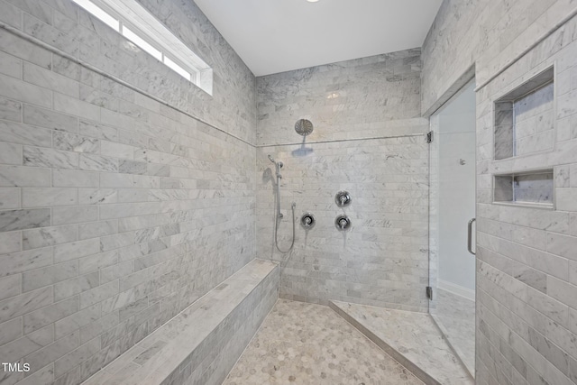 bathroom with a stall shower