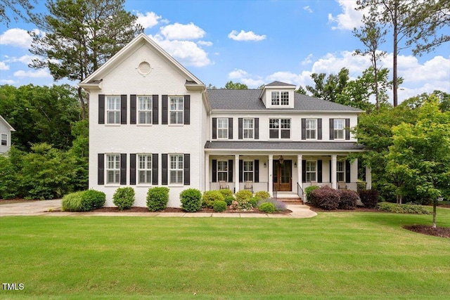 1141 Barley Stone Way, Raleigh, NC 27603 - view of front of home with covered porch and a front lawn