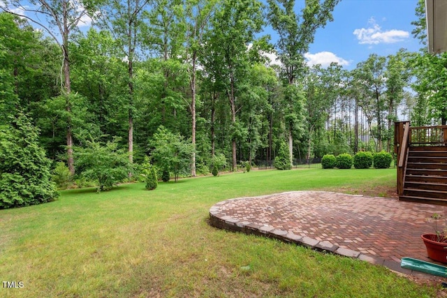 1141 Barley Stone Way, Raleigh, NC 27603 - view of green lawn with stairs and a patio area