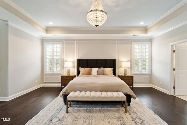 1141 Barley Stone Way, Raleigh, NC 27603 - bedroom with multiple windows, a tray ceiling, wood finished floors, and ornamental molding