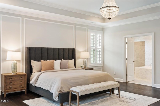 1141 Barley Stone Way, Raleigh, NC 27603 - bedroom with a chandelier, dark wood-style flooring, crown molding, baseboards, and ensuite bathroom