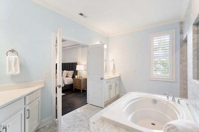 1141 Barley Stone Way, Raleigh, NC 27603 - ensuite bathroom with vanity, a garden tub, and ornamental molding