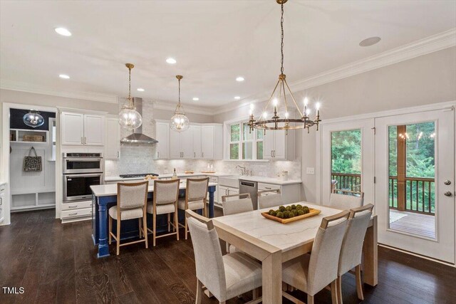 1141 Barley Stone Way, Raleigh, NC 27603 - dining area with a chandelier, crown molding, dark wood-style flooring, and recessed lighting