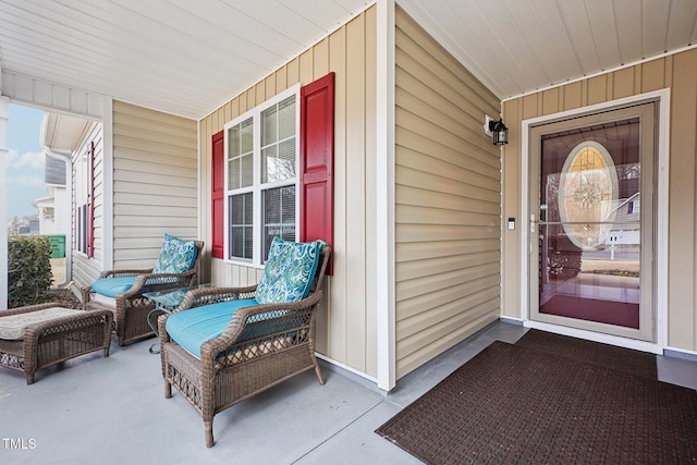 doorway to property featuring covered porch