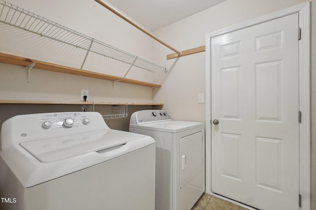 laundry area featuring washing machine and dryer