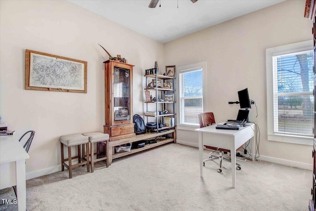 office with ceiling fan and carpet