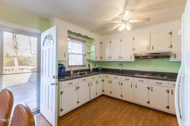 kitchen featuring wood-type flooring, white cabinetry, sink, white electric stovetop, and ornamental molding