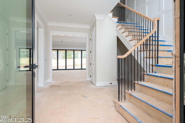 stairs featuring ornamental molding