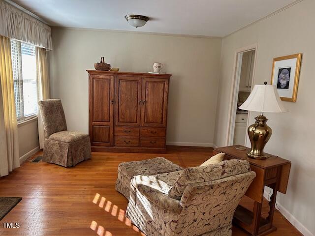 living area with light hardwood / wood-style floors