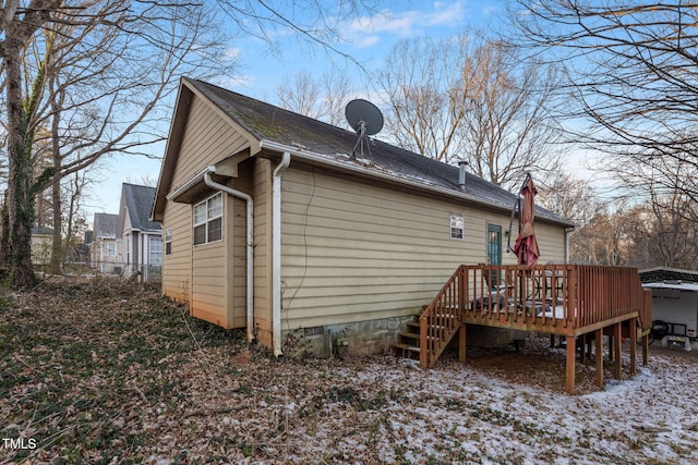 exterior space featuring a wooden deck