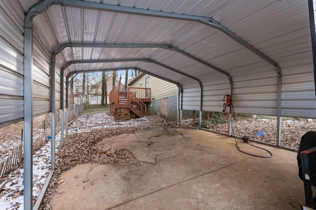 view of vehicle parking with a carport