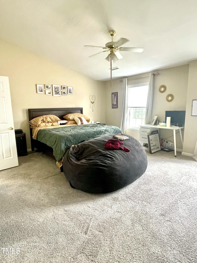 bedroom with ceiling fan and carpet flooring