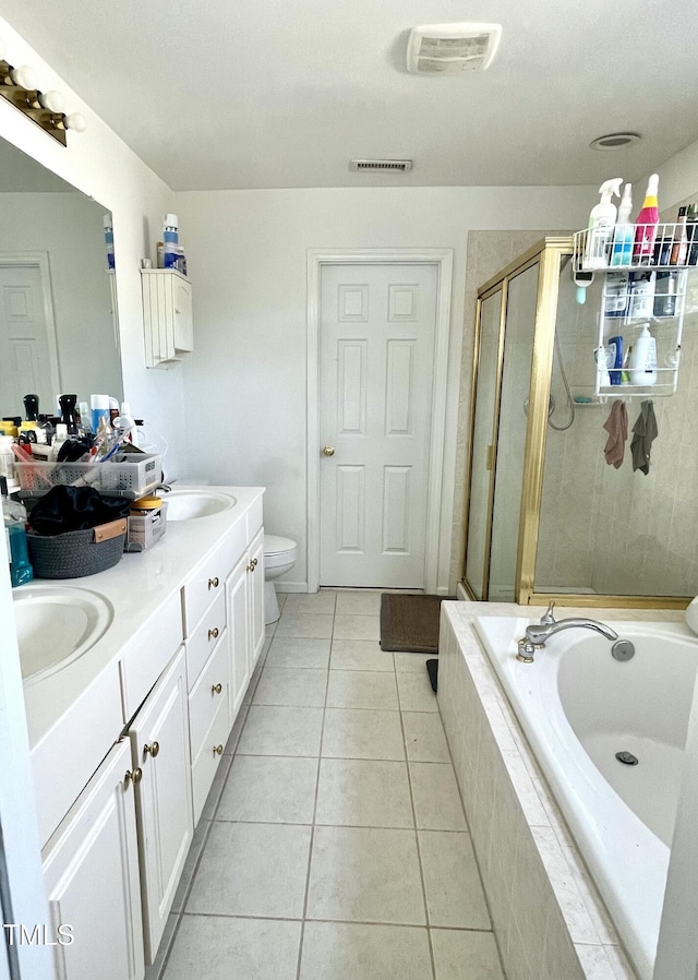 full bathroom with vanity, separate shower and tub, tile patterned floors, and toilet