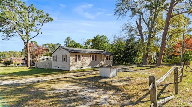 exterior space featuring fence